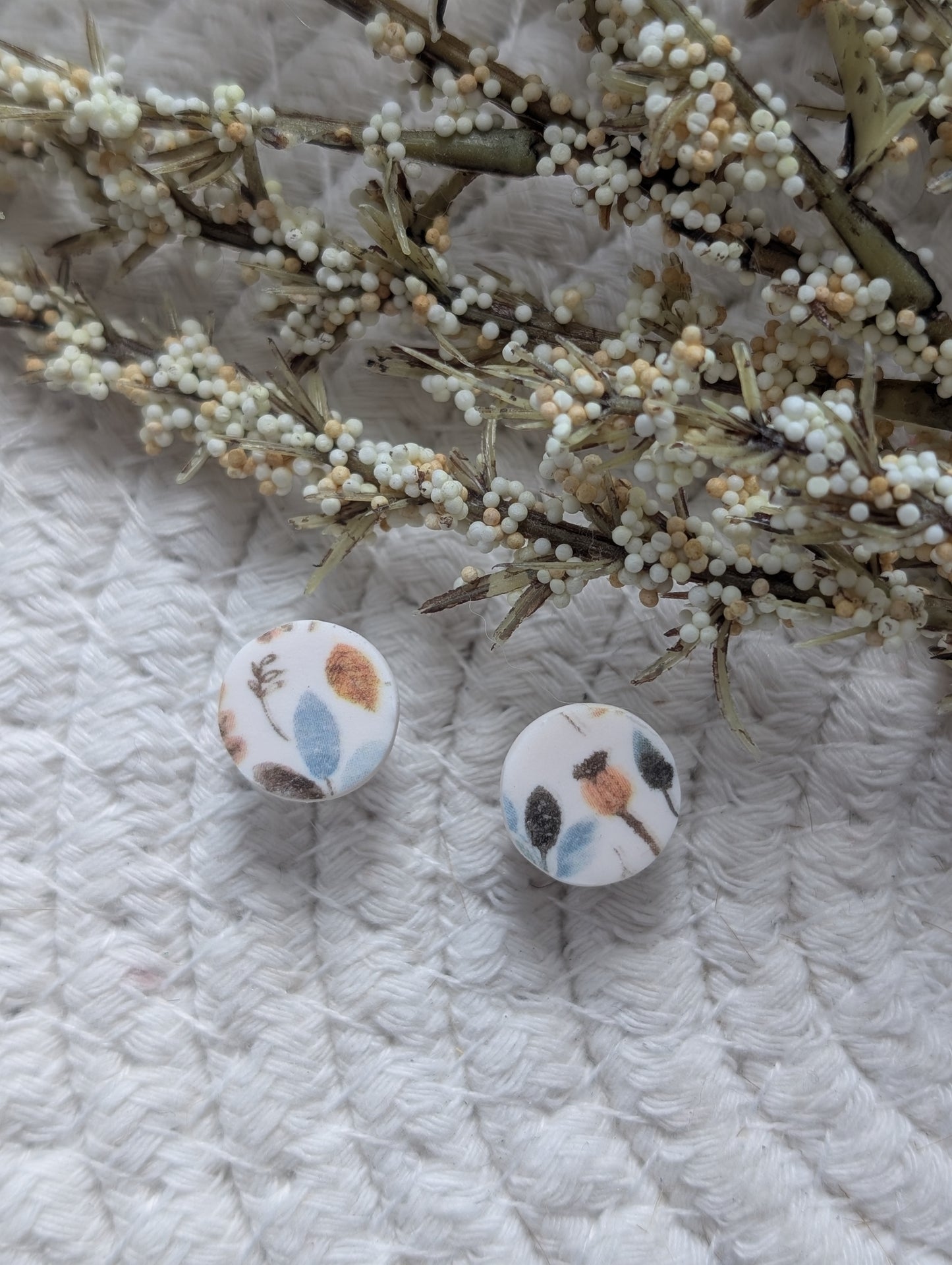 Stud en argile polymère motif varié